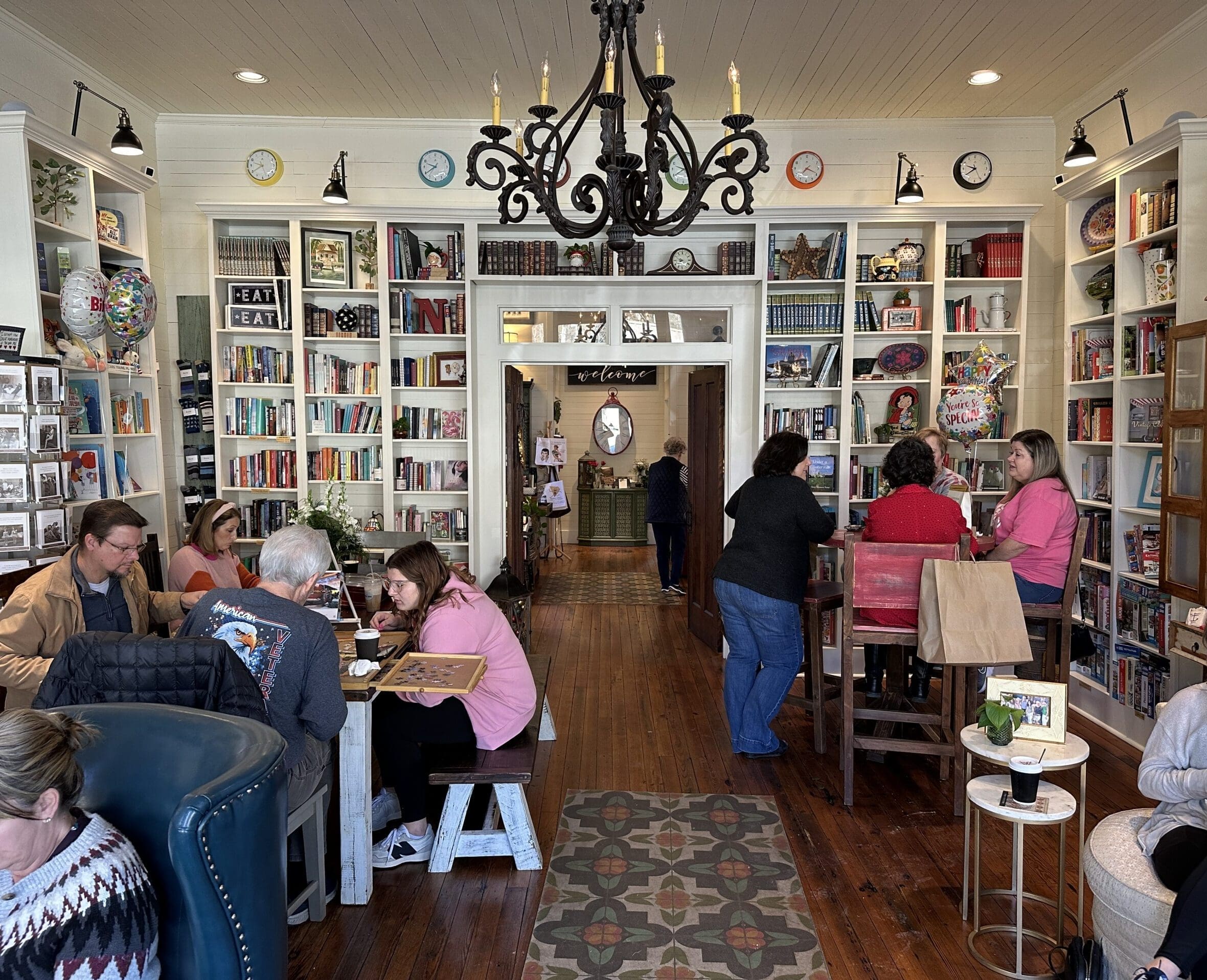 People socializing in Nichols Nook cafe and bookstore in Springville, AL.