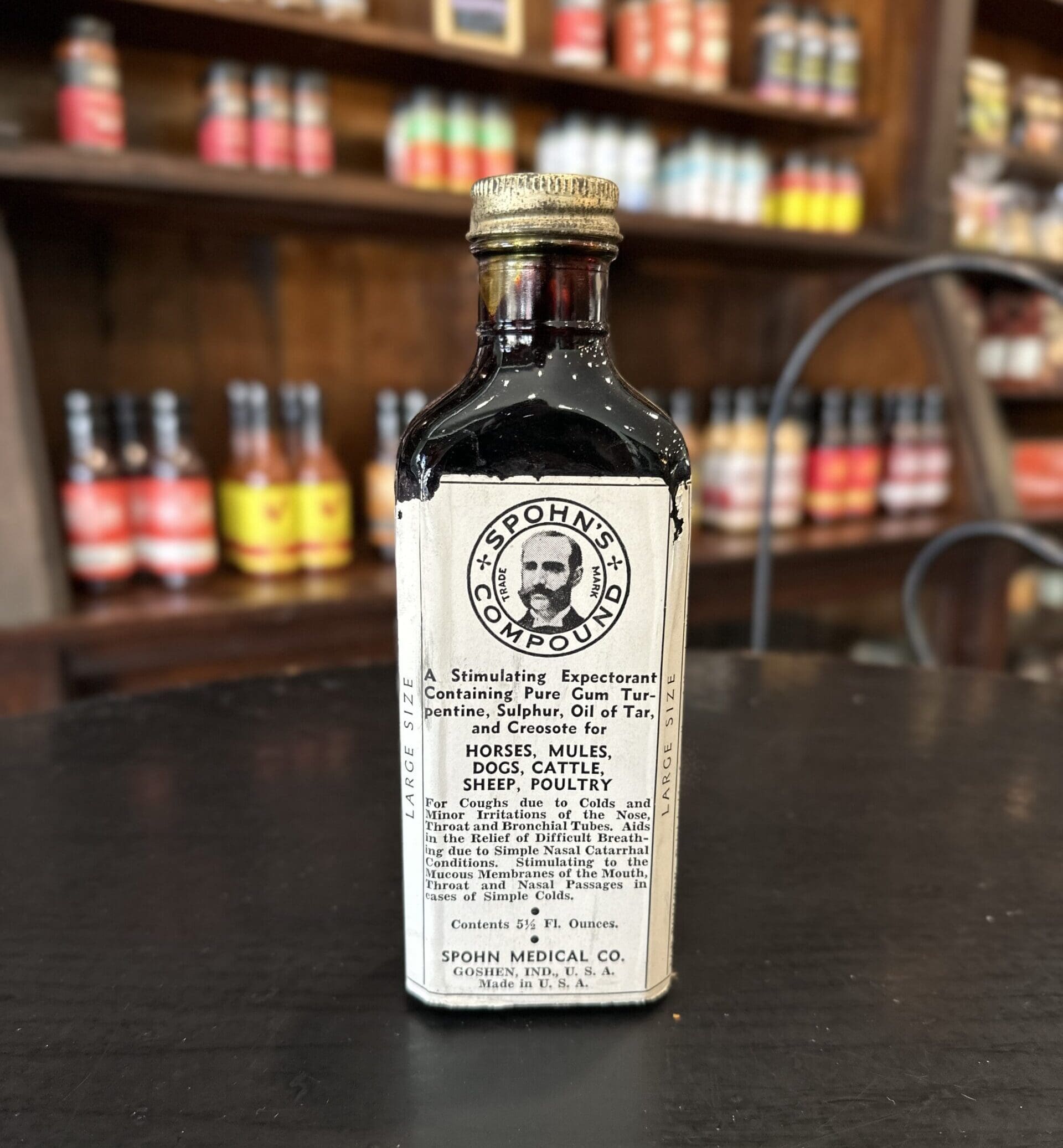 Unopened, vintage medicine bottle labeled "Spohn's Compound".